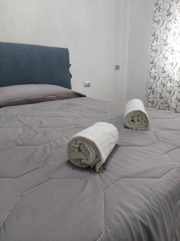 Posteľ alebo postele v izbe v ubytovaní L'APPARTAMENTO DEL MARE