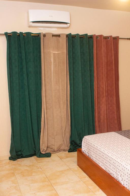 Postel nebo postele na pokoji v ubytování RESIDENCE rubis