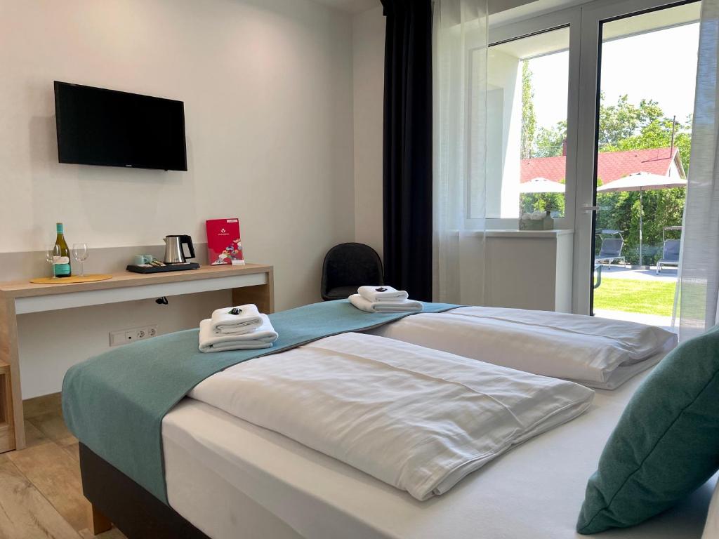 Postel nebo postele na pokoji v ubytování Villa7 Balaton