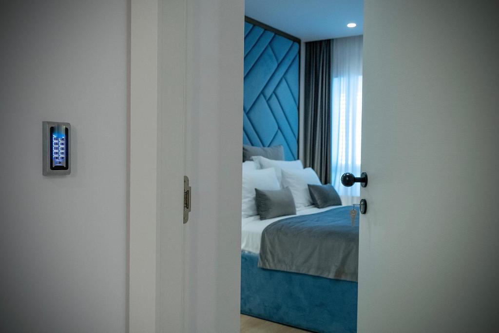 Posteľ alebo postele v izbe v ubytovaní Amélie Luxury Rooms