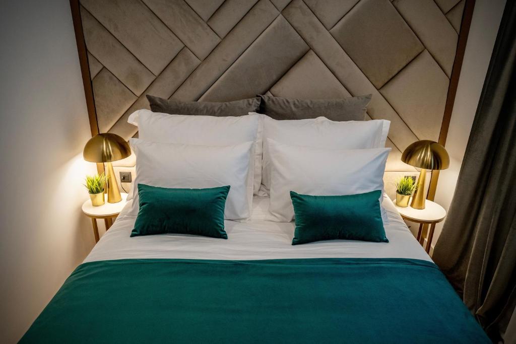 Posteľ alebo postele v izbe v ubytovaní Amélie Luxury Rooms
