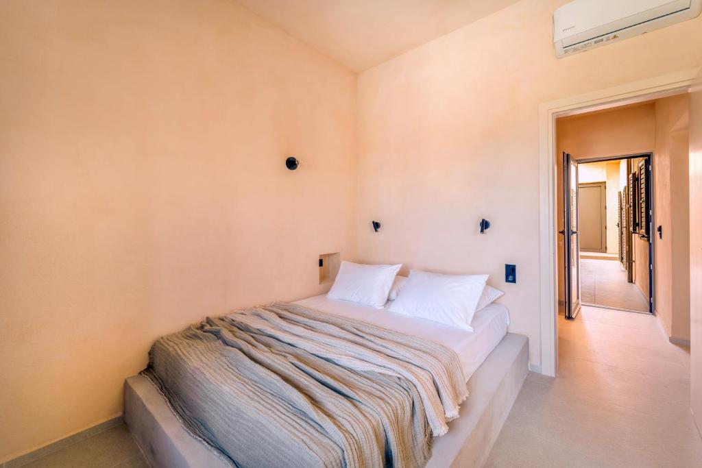 Posteľ alebo postele v izbe v ubytovaní Kaliva Residence