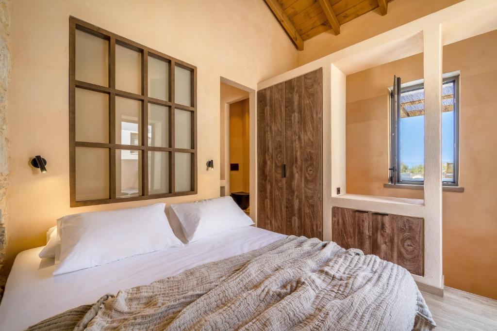 Posteľ alebo postele v izbe v ubytovaní Kaliva Residence