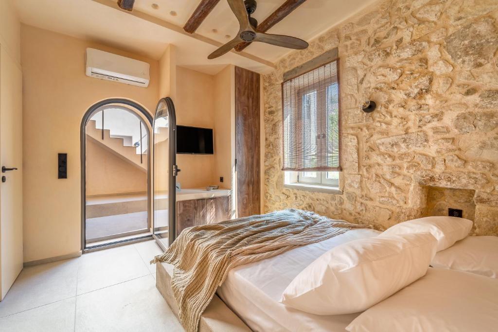 Posteľ alebo postele v izbe v ubytovaní Kaliva Residence