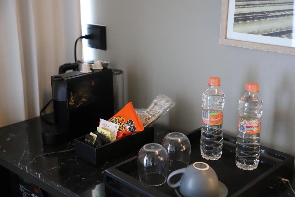 Příslušenství pro přípravu čaje a kávy v ubytování Bellwort Hotel