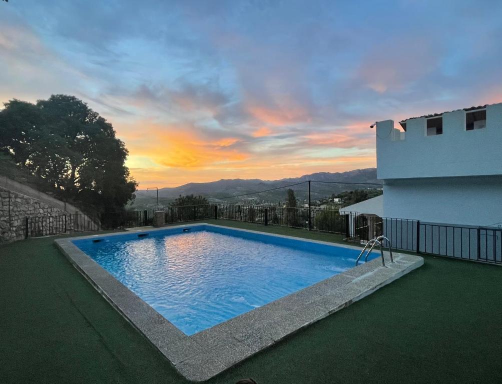 a large swimming pool on the roof of a house at NOVIEMBRE La Iruela in La Iruela