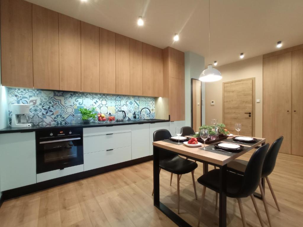Kuchyňa alebo kuchynka v ubytovaní Apartament Agat - AZW Gdańsk