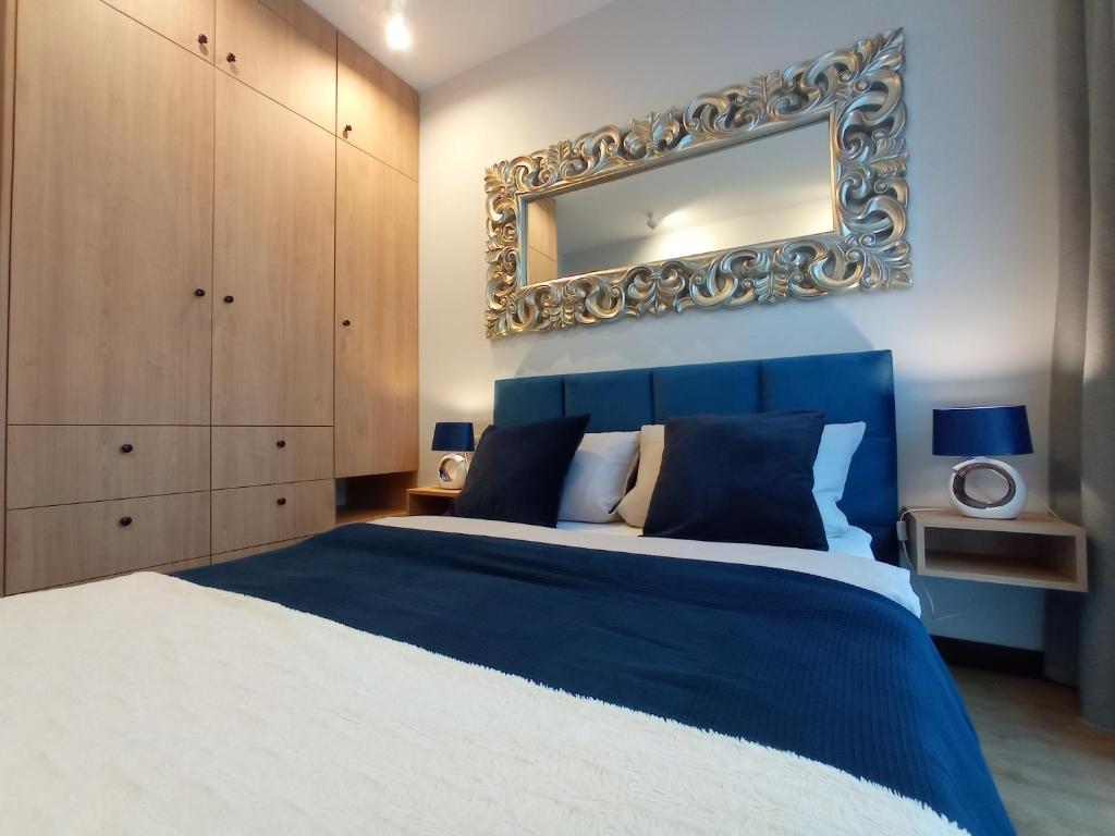 Posteľ alebo postele v izbe v ubytovaní Apartament Agat - AZW Gdańsk