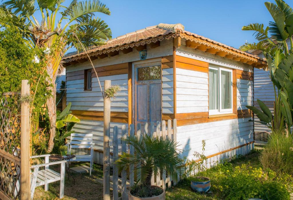 Zahrada ubytování CABAÑA LA PALMERITA en Playa El Palmar
