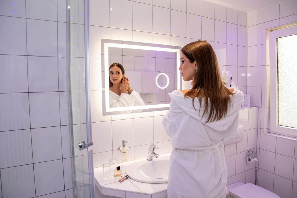 Koupelna v ubytování Hotel Merkur - Superior