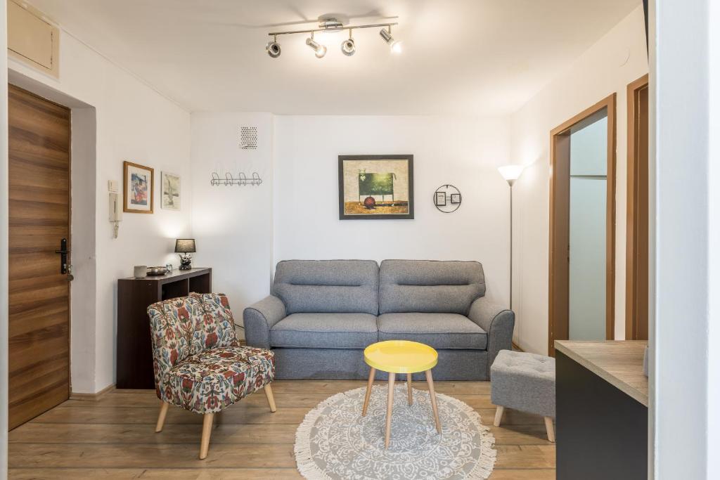 Posedenie v ubytovaní Sunny City Apartment