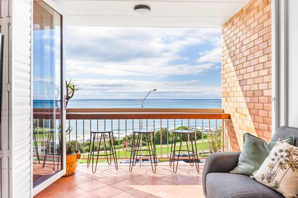 a balcony with a view of the ocean at Stunning Views at Alex Heads, 2 BR Stylish Apt in Alexandra Headland