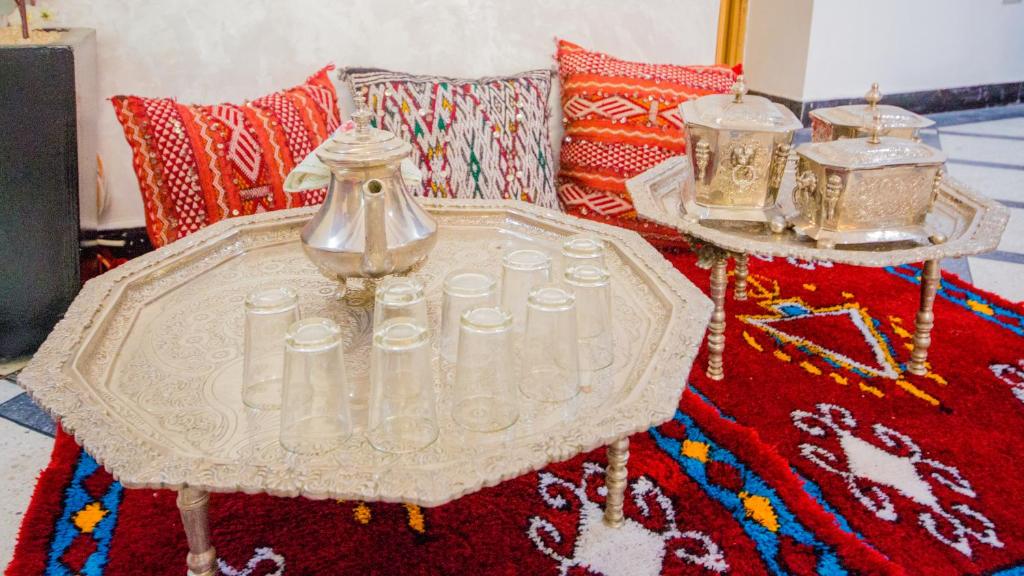 Postel nebo postele na pokoji v ubytování Riad Mahrez