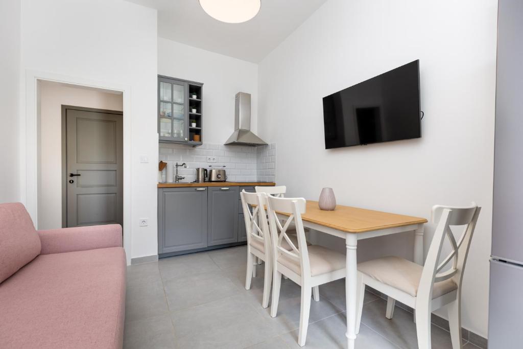 Kuchyň nebo kuchyňský kout v ubytování Apartments Cukar