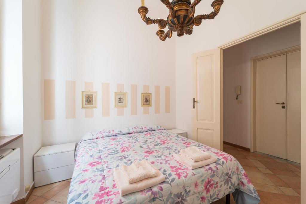 A bed or beds in a room at Seaview Alghero Apt