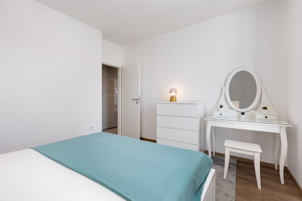 Postel nebo postele na pokoji v ubytování Apartments Cukar
