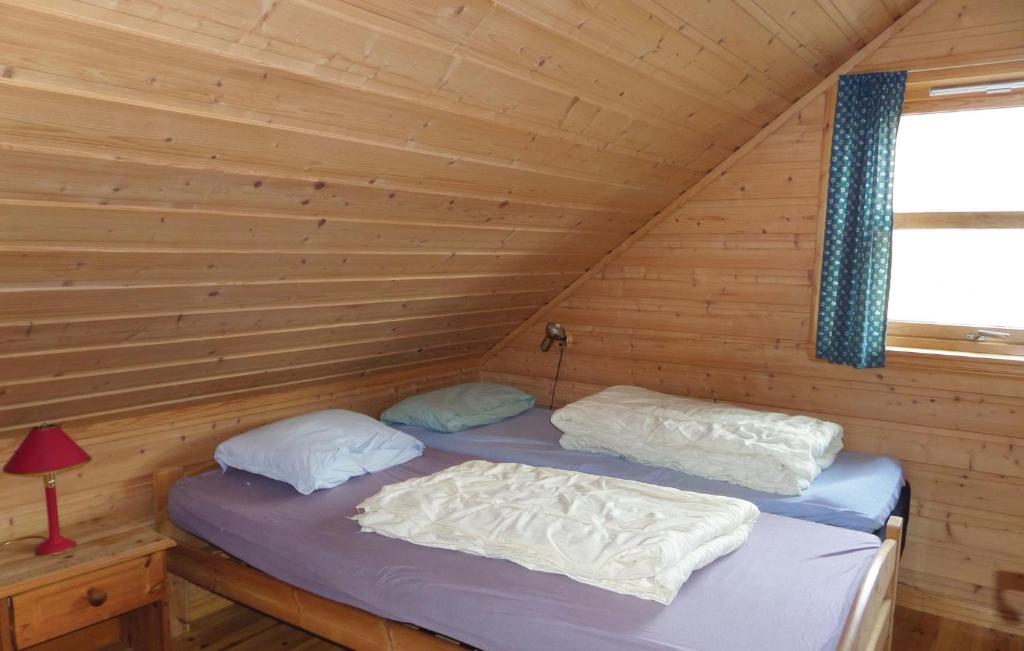 Postel nebo postele na pokoji v ubytování Cozy Apartment In Rosendal With Sauna