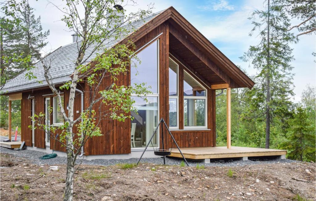 a tiny house in the woods at Awesome Home In Skollenborg With 3 Bedrooms in Lindåskroken