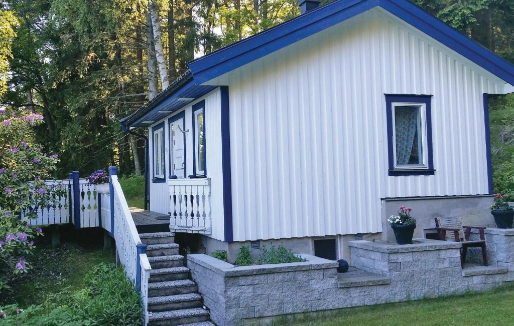 a tiny house with a staircase in a yard at 1 Bedroom Stunning Home In Svanesund in Svanesund