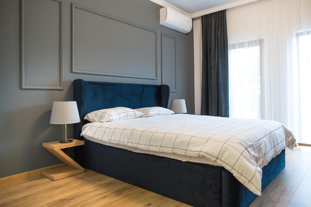 Postel nebo postele na pokoji v ubytování Deluxe Central Rooms