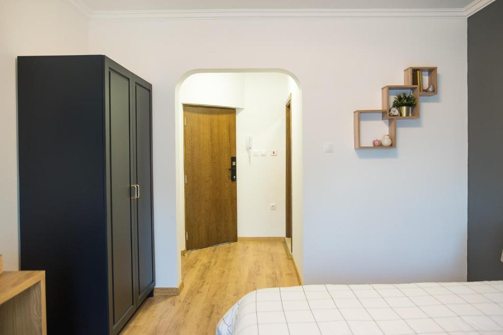 Postel nebo postele na pokoji v ubytování Deluxe Central Rooms