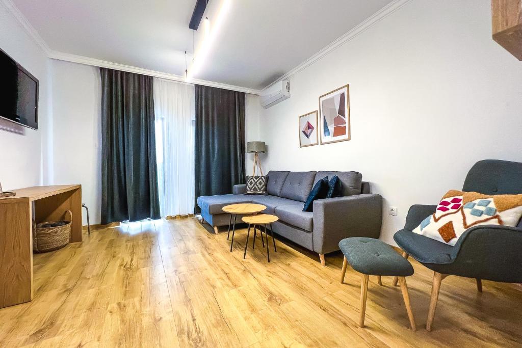 Posezení v ubytování Deluxe Central Rooms