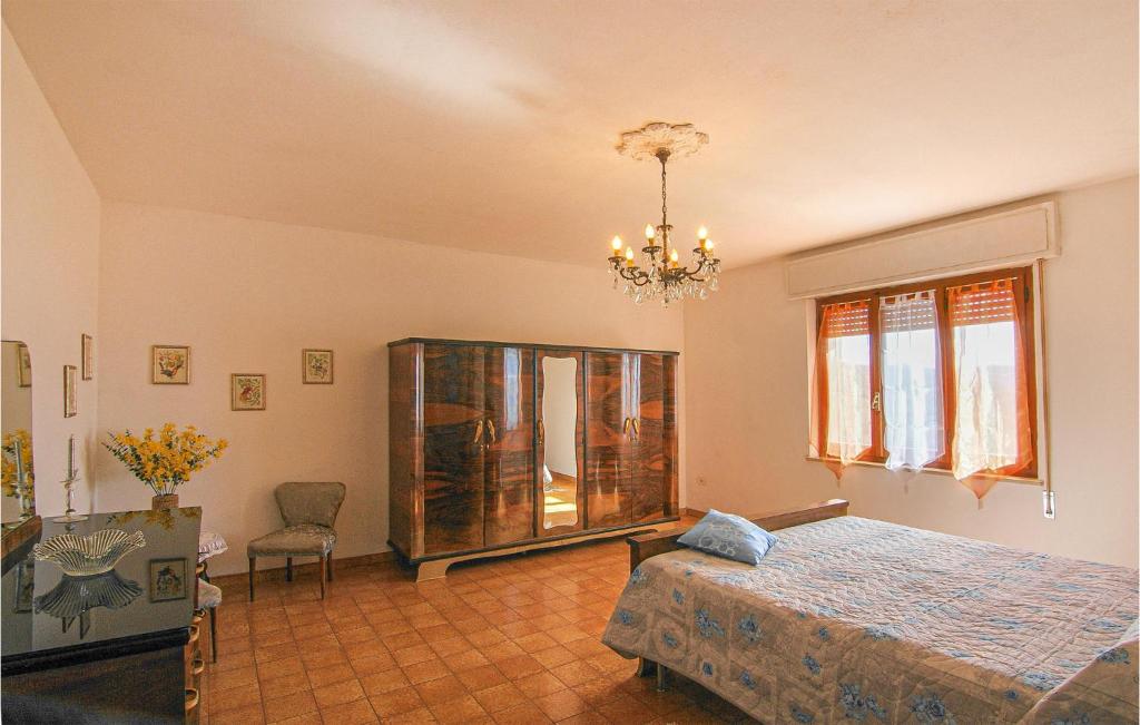 Posteľ alebo postele v izbe v ubytovaní Beautiful Apartment In Magliano