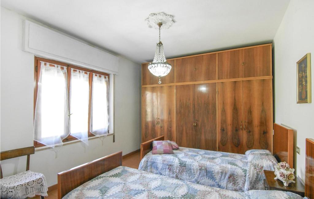 Posteľ alebo postele v izbe v ubytovaní Beautiful Apartment In Magliano