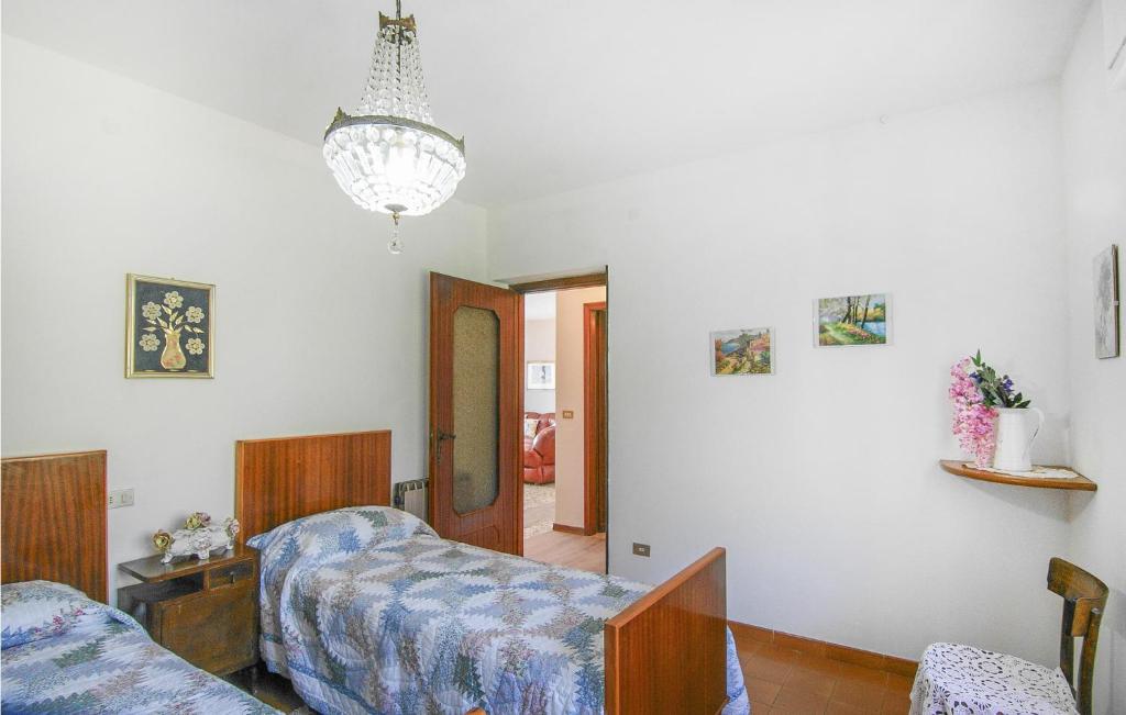 Posteľ alebo postele v izbe v ubytovaní Beautiful Apartment In Magliano