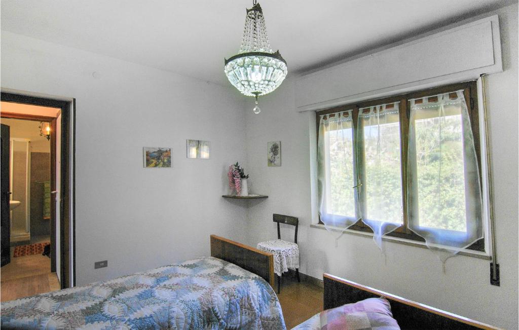 Posteľ alebo postele v izbe v ubytovaní Beautiful Apartment In Magliano