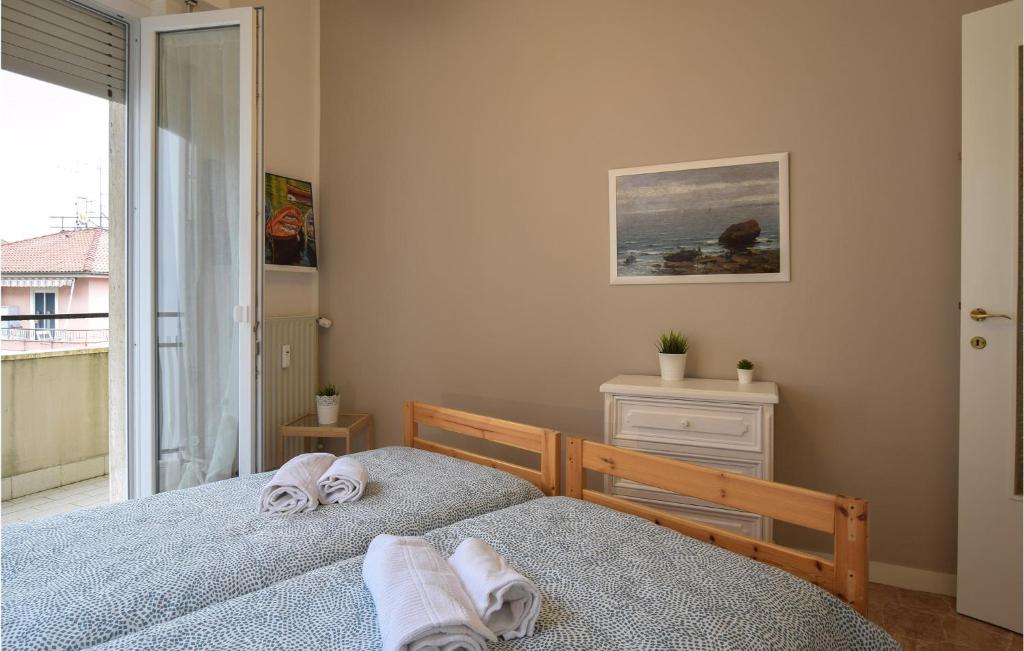 Posteľ alebo postele v izbe v ubytovaní 2 Bedroom Lovely Apartment In Chiavari