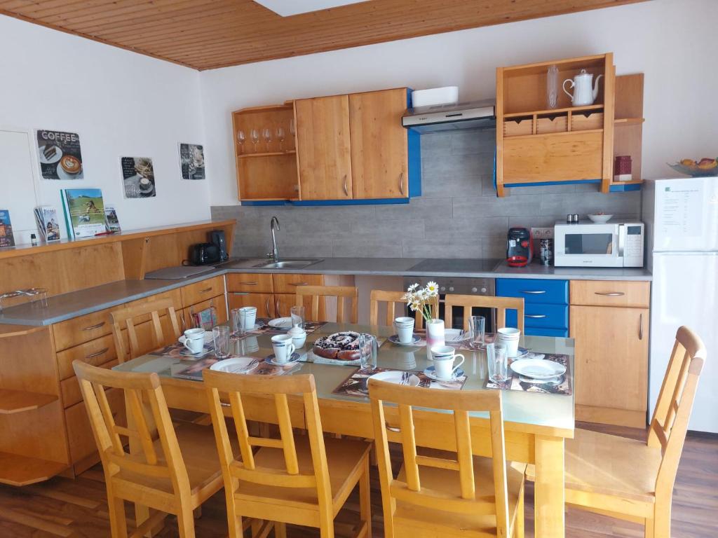Kuchyň nebo kuchyňský kout v ubytování Sigi Apartment