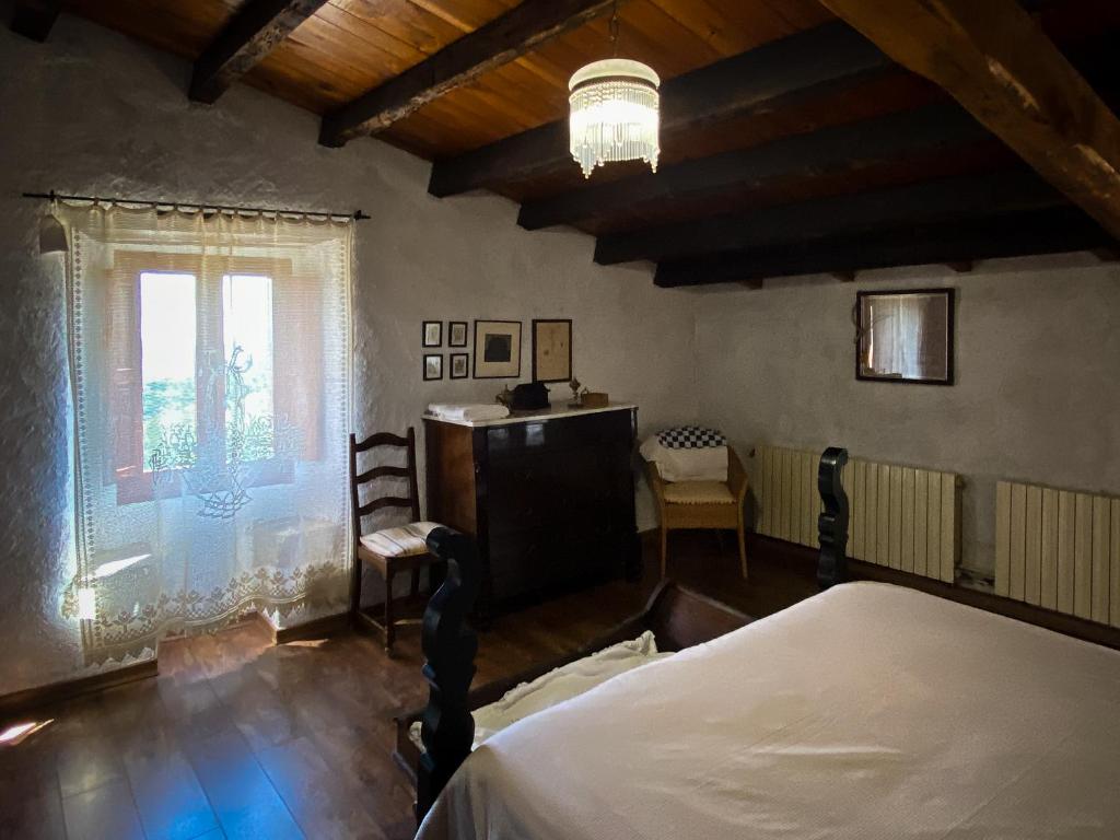 Postel nebo postele na pokoji v ubytování El Buxaus de la Muntanya