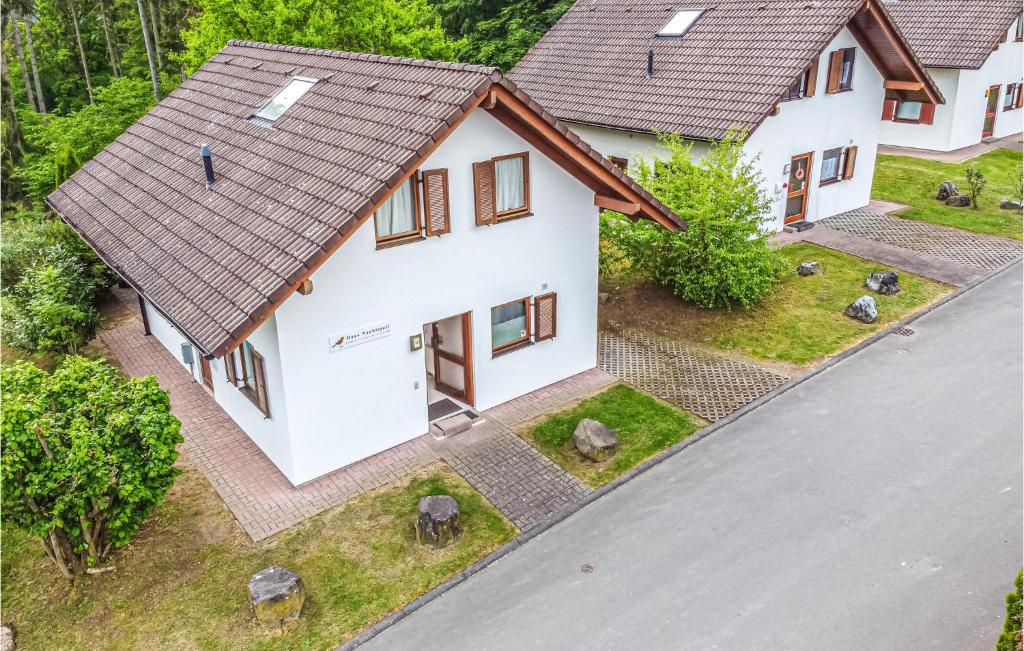 an overhead view of a white house with a brown roof at Ferienhaus 12 In Kirchheim in Kirchheim