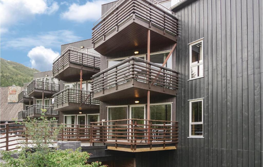a building with balconies on the side of it at Gorgeous Apartment In Hemsedal in Hemsedal