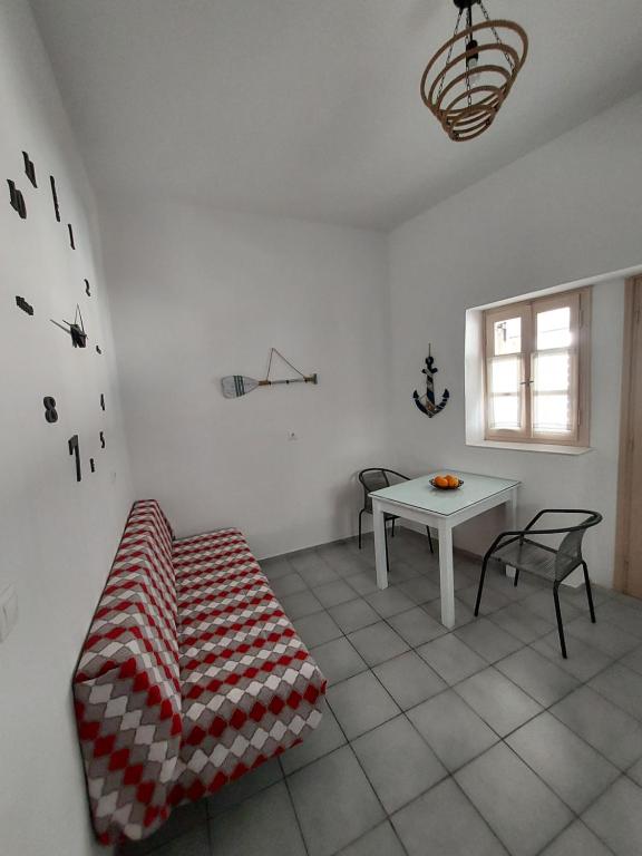Postel nebo postele na pokoji v ubytování Aegean Window 1