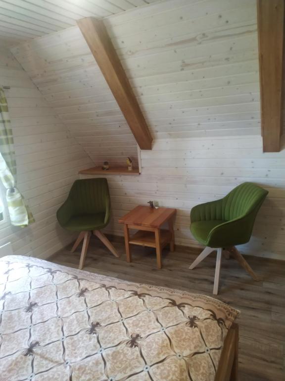 Postel nebo postele na pokoji v ubytování Chata Sosna