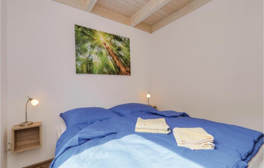Postel nebo postele na pokoji v ubytování Ferienhausdorf Thale
