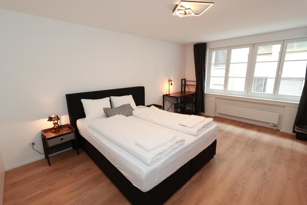 Postel nebo postele na pokoji v ubytování KoBi Apartments Falkenplatz