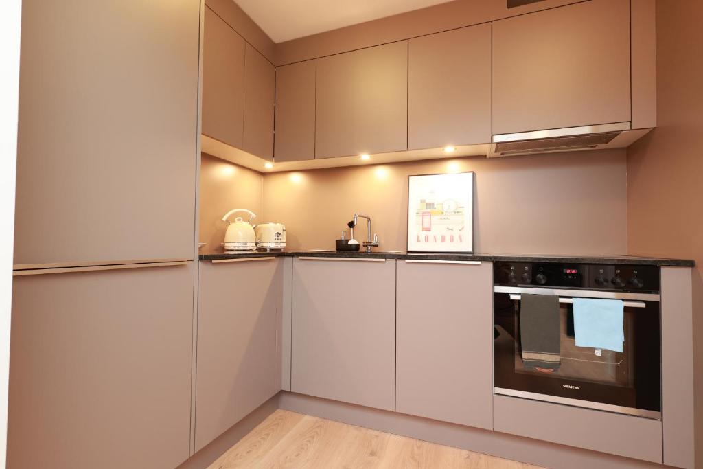 Kuchyň nebo kuchyňský kout v ubytování KoBi Apartments Falkenplatz