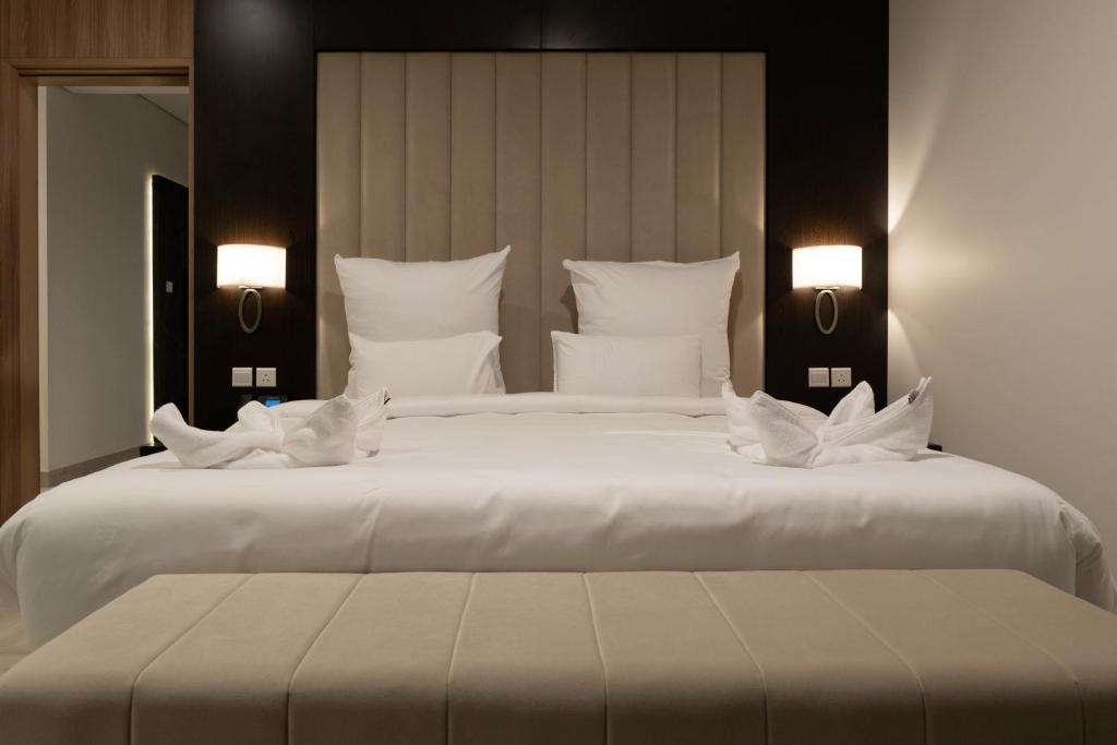 Postel nebo postele na pokoji v ubytování Mirot Hotel
