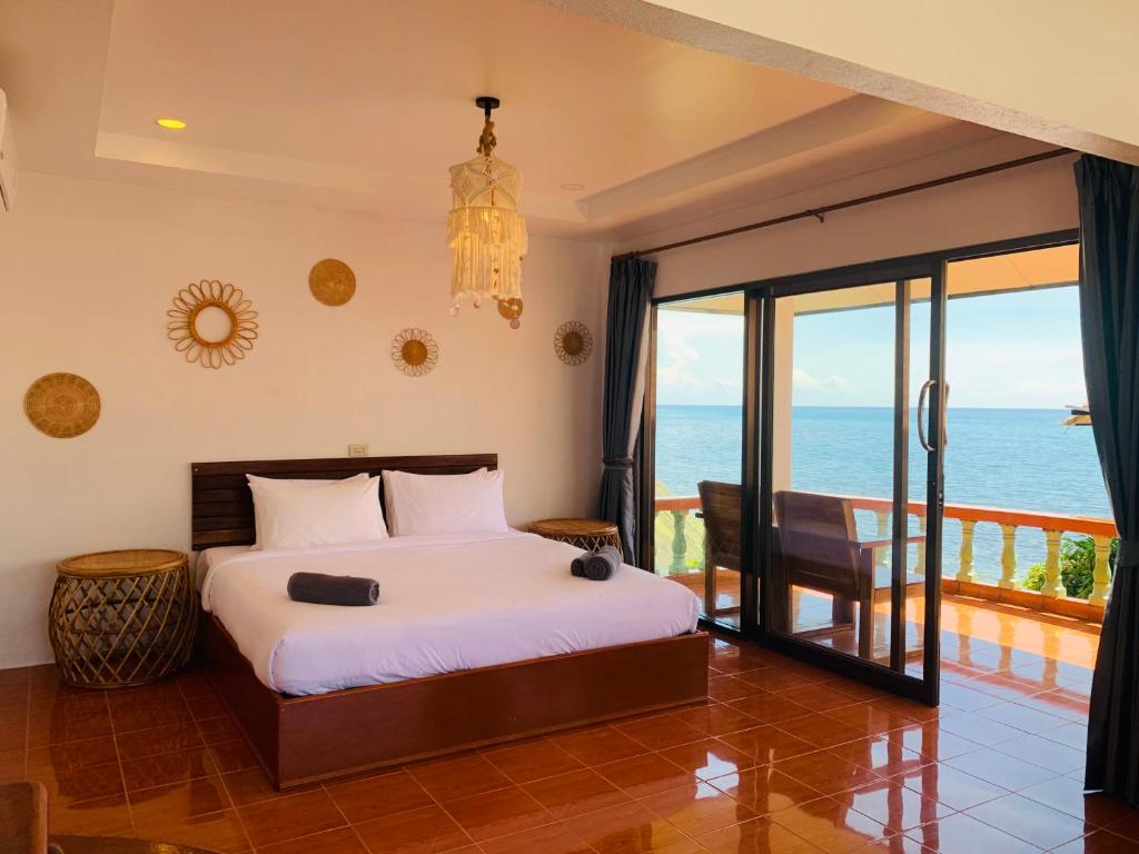 Postel nebo postele na pokoji v ubytování Koh Tao Heritage