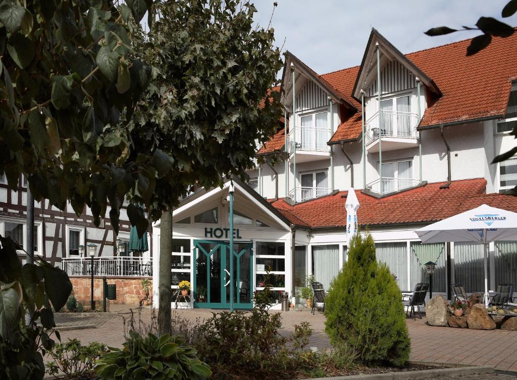 a hotel in front of a building at Hotel Landgasthaus Schäferhof in Alsfeld