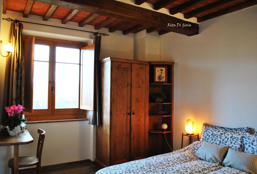 Postel nebo postele na pokoji v ubytování B&B Lavanda e Rosmarino