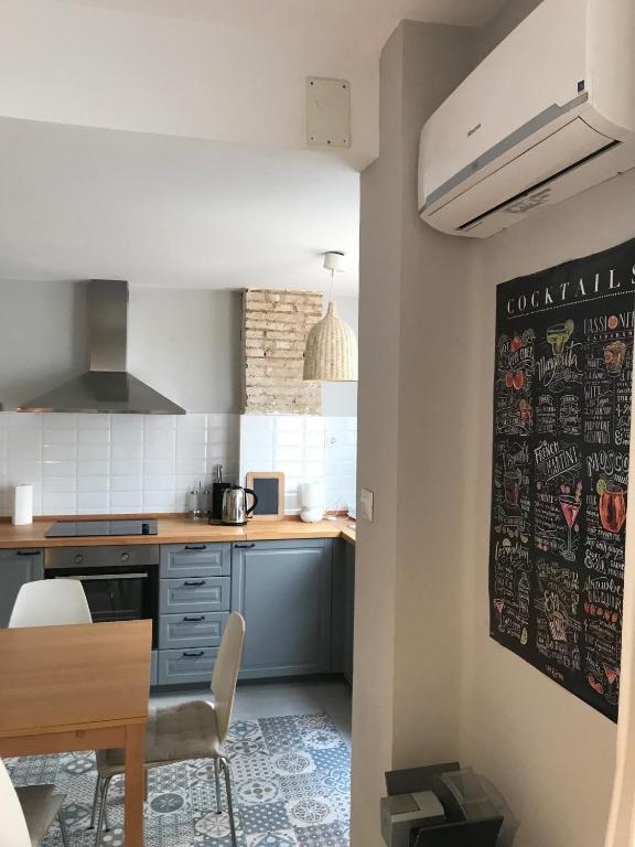 Kuchyň nebo kuchyňský kout v ubytování 2 Apartamento TERRAZA Free Wifi