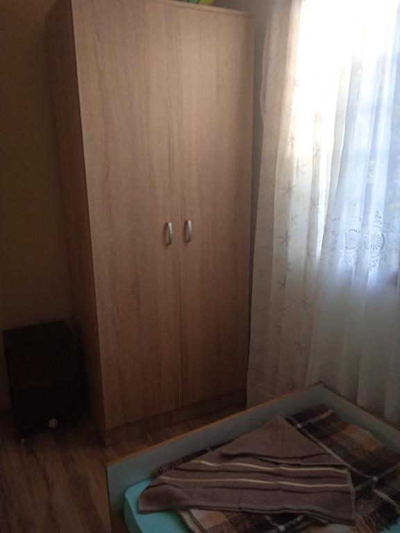 Postel nebo postele na pokoji v ubytování Oaza Kumbor
