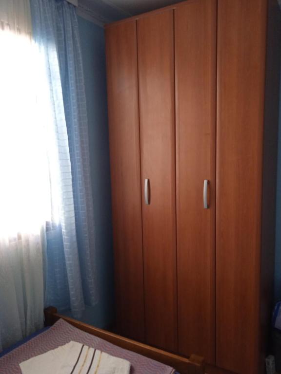 Postel nebo postele na pokoji v ubytování Oaza Kumbor
