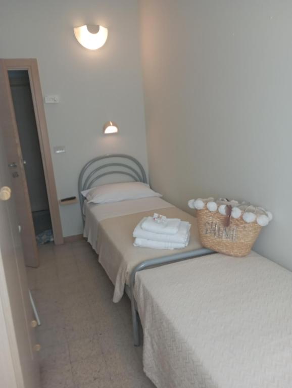 Postel nebo postele na pokoji v ubytování Hotel Raul