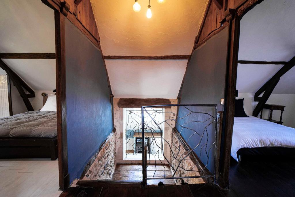 Posteľ alebo postele v izbe v ubytovaní Maison de charme à proximité de Pau - 3 chambres - 6 p - Jardin