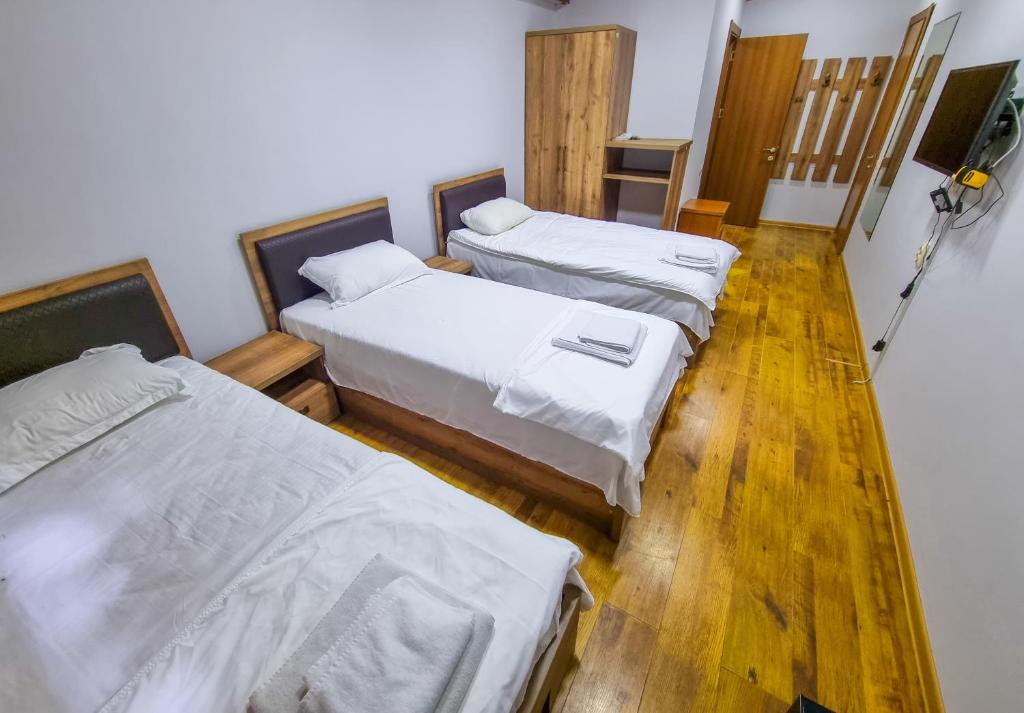 Postel nebo postele na pokoji v ubytování Mtirala National Park hotel ORBEZA